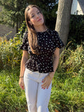 Polka dot top met pofmouwen